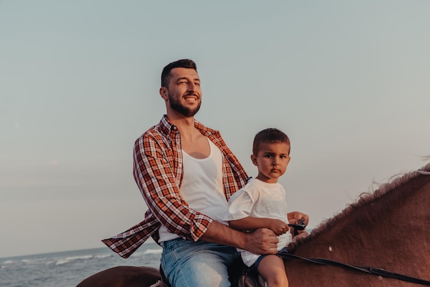 Father and son enjoy riding horses together by the sea. Selective focus . High quality photo