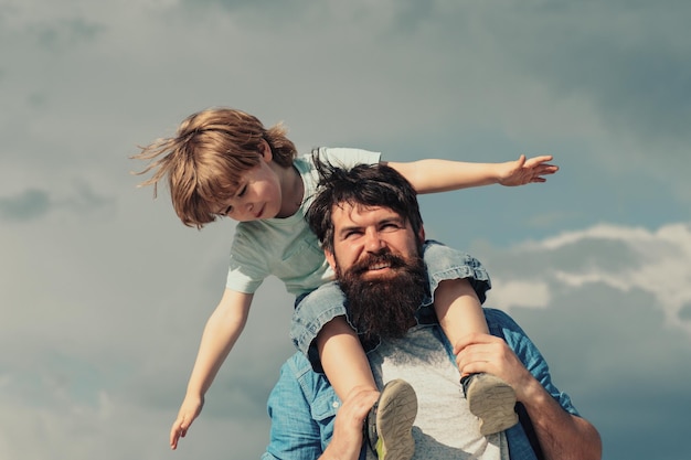 Father and son family time daddy and child son happy kid playing airplane portrait of happy father g