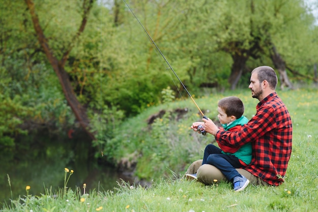 Father and son fishing together