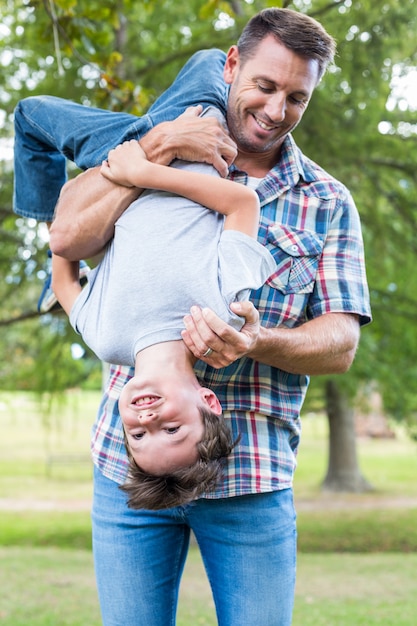 Father and son having fun in the park