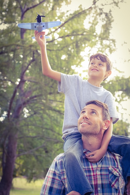 Father and son having fun in the park