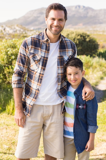 Photo father and son on a hike together