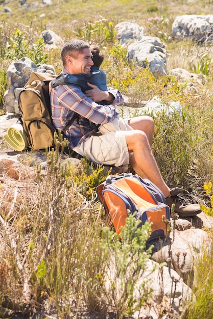 Father and son hiking in the mountains 