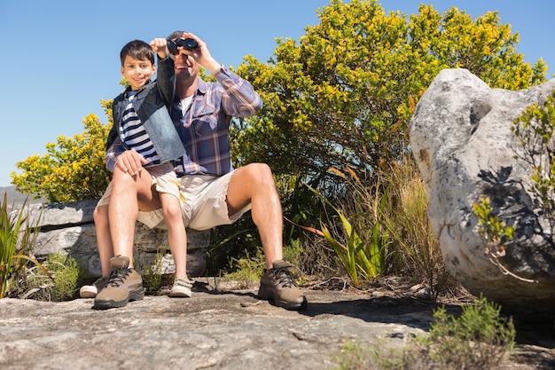 Father and son hiking in the mountains 