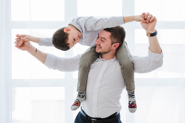 Father and son playing together on fathers day