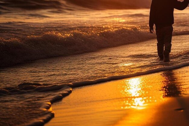 Photo father and son to the sea at sunset