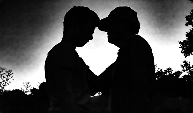 Photo father and son silhouette