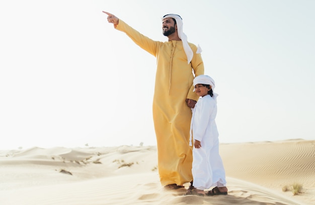 Father and son spending time in the desert