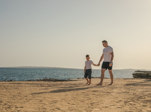 Father and  son  spending time together sea vacation