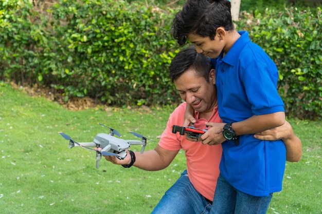 Father and son with drone