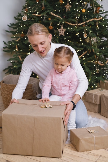 Father with child getting ready for christmas