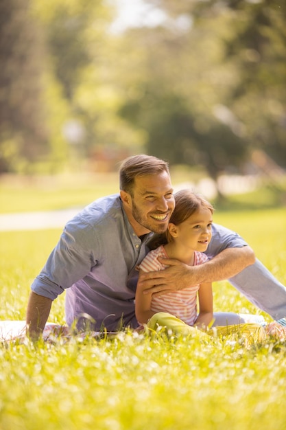 Father with daughter having fun at the park