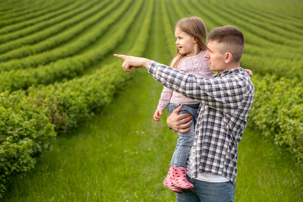 Father with girl at farm