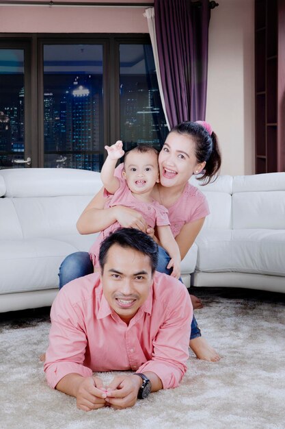 Father with his child and wife at apartment