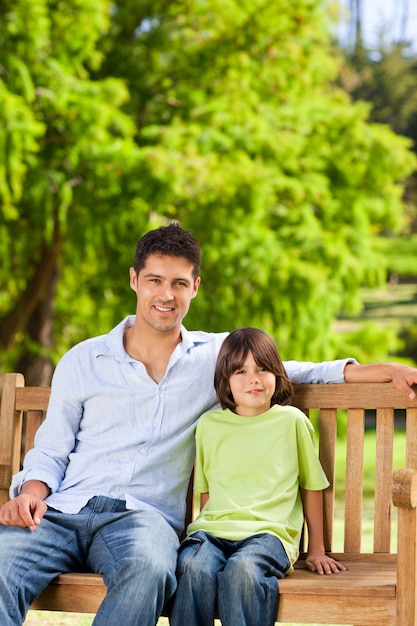 Father with his son on the bench