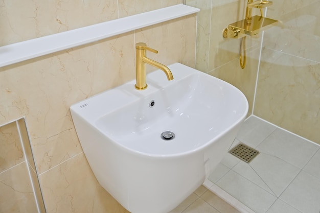 The faucet is in gold color which gives it a very luxurious feel