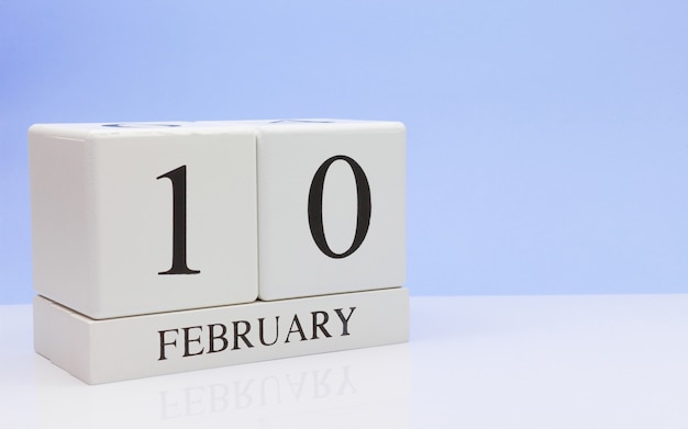 February 10st. Day 10 of month, daily calendar on white table.