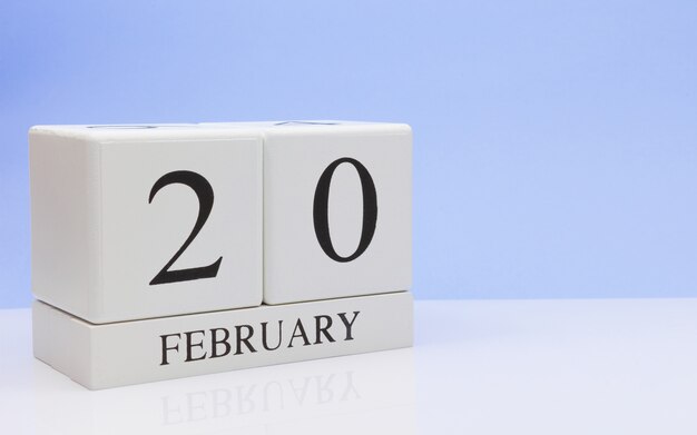 February 20st. Day 20 of month, daily calendar on white table.