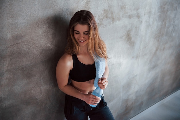 Feeling calm.  gorgeous blonde woman in the gym at her weekend time.