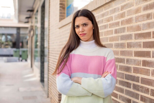 Feeling displeased and disappointed looking serious annoyed and angry with crossed arms