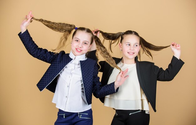 Feeling good fabulous hair Little hair models with beauty looks Small girls with long blond hair Adorable girls with hair into ponytails