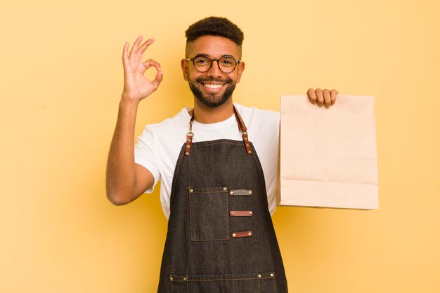 Photo feeling happy showing approval with okay gesture