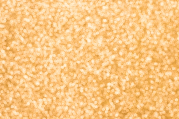 Feestelijke gouden onduidelijk beeld bokeh achtergrond