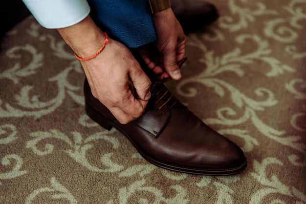 Feet of bride and groom wedding shoes