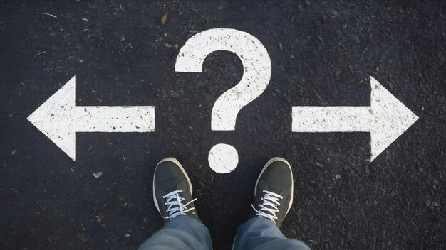 Photo feet standing on asphalt with arrows pointing left and right with question mark