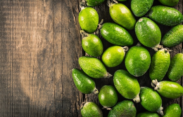 Feijoa fruit on wooden background