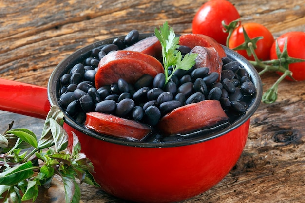 Feijoada, a stew of beans with beef and pork, which is a typical Brazilian dish originated with the slaves in Brazil