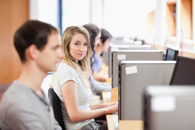 Fellow students using a computer