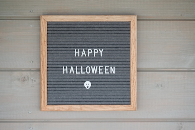 Felt Board in a wooden frame with the inscription happy Halloween