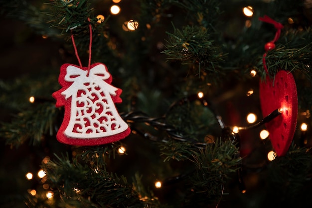 Felt ornaments decorating the Christmas tree with lights