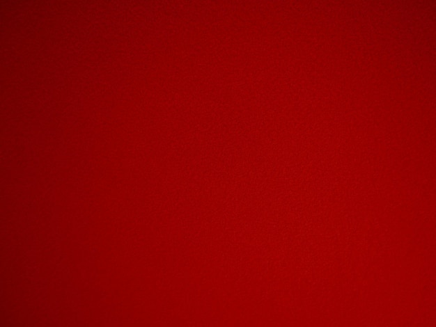 Красный мягкий грубый текстильный материал фоновой текстуры близкий покерный стол теннисный стол ткань пустая красная ткань фон