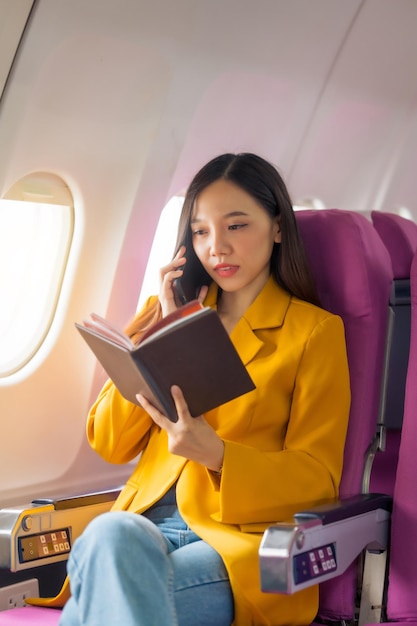 Female airplane passengers asian chinese people entrepreneurs on flight venturing overseas