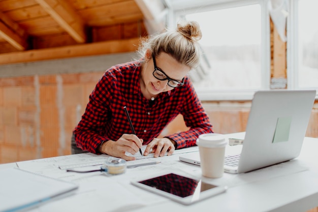 female architect working at desk in office