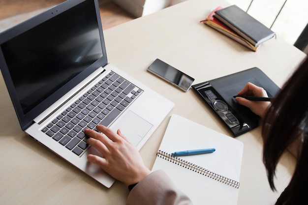 Female architect working on graphic tablet