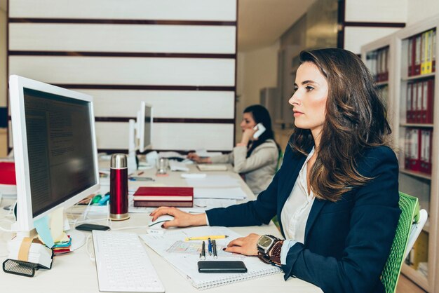 Female architects working in office