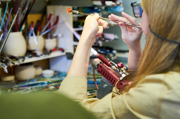 Female Artist Making Glass Beads