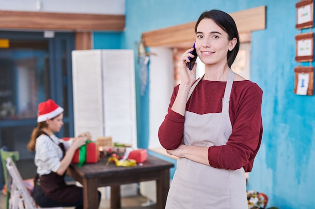 Female Artist Speaking by Phone