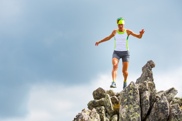 Female athlete running trail