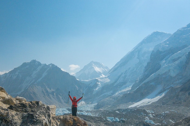 Female backpacker enjoying the view on mountain walk in
himalayas everest base camp trail route nepal trekking himalaya
tourism