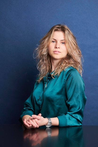 Female in blue shirt