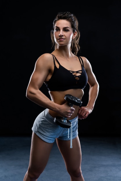 Female bodybuilder wearing getting ready for workout