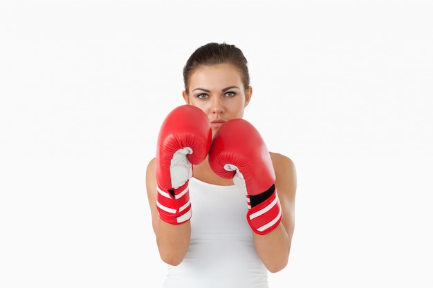 Female boxer in defensive stance