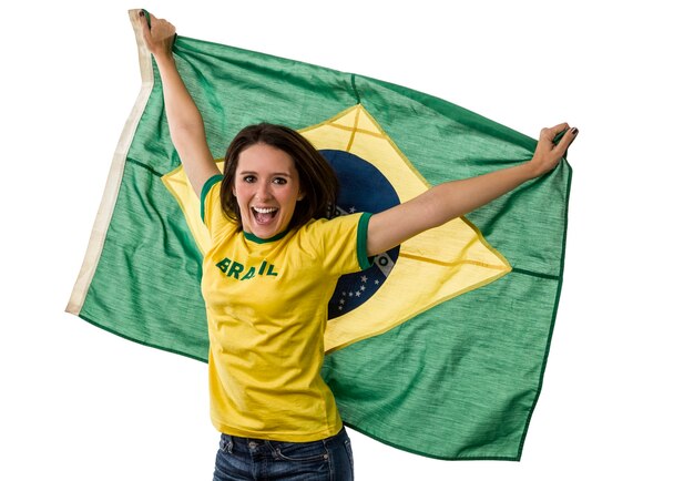 Female brazilian fan celebrating on a white space.