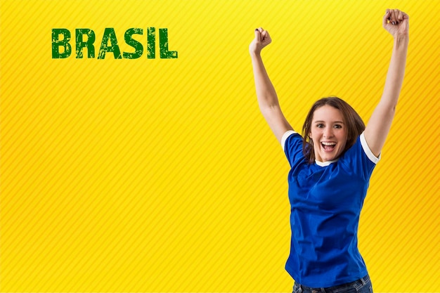 Female brazilian fan celebrating