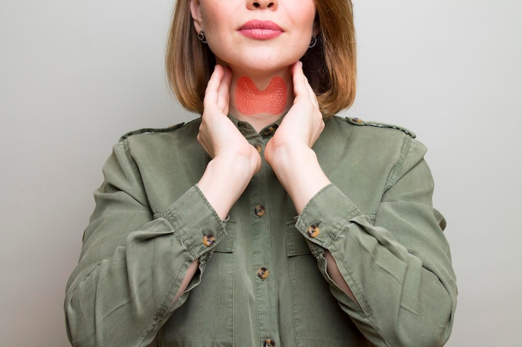 Photo female checking thyroid gland by herself thyroid disorder includes goiter hyperthyroid hypothyroid tumor or cancer health care