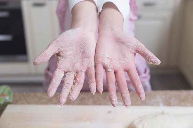 Female chef hands at work